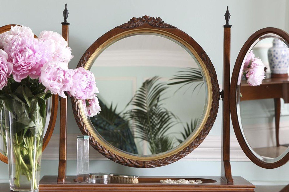 Image of round Louis XV mirror with pink flowers