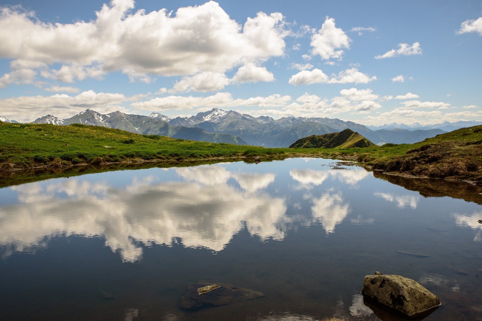 Sky, mountains and still lake