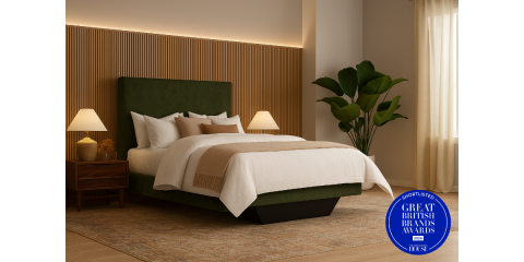 The Signature Collection featuring the Freya headboard and floating base upholstered in dark green fabric