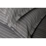 Pair of Charcoal grey St. Leger pinstripe cotton pillowcases neatly arranged on bed.