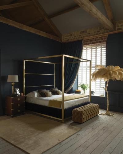 The Hoxton Four Poster reimagines a classic. Upholstered in rich midnight blue velvet and finished wi...